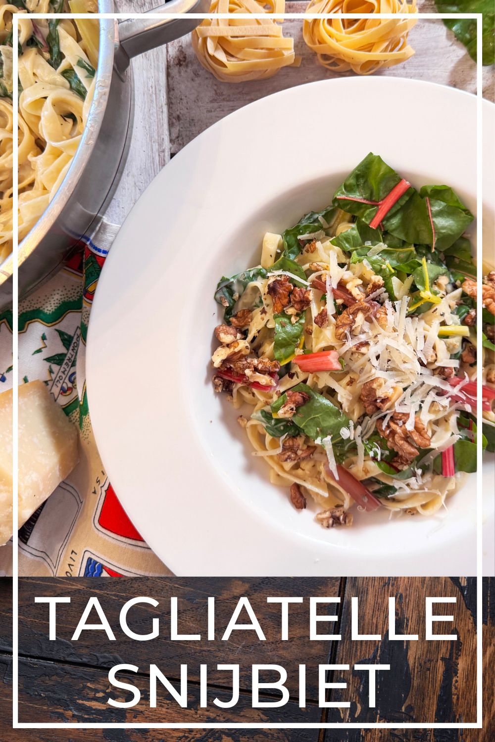 tagliatelle with Swiss chard, cream sauce and walnuts on a rustic plate