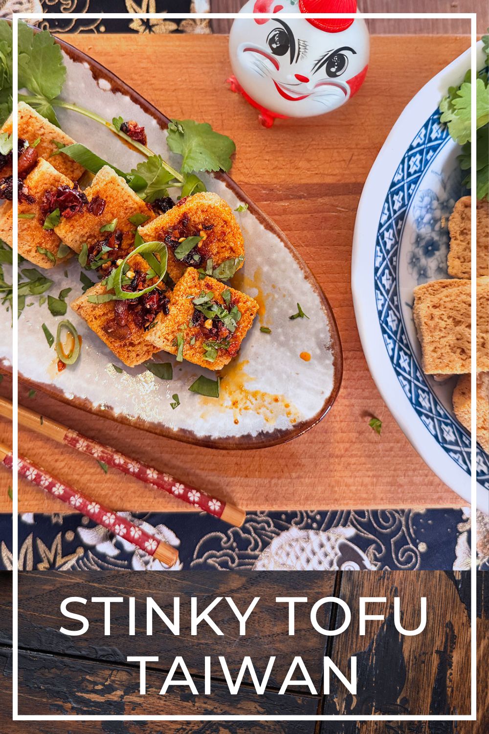 Taiwanese stinky tofu street food on a night market plate