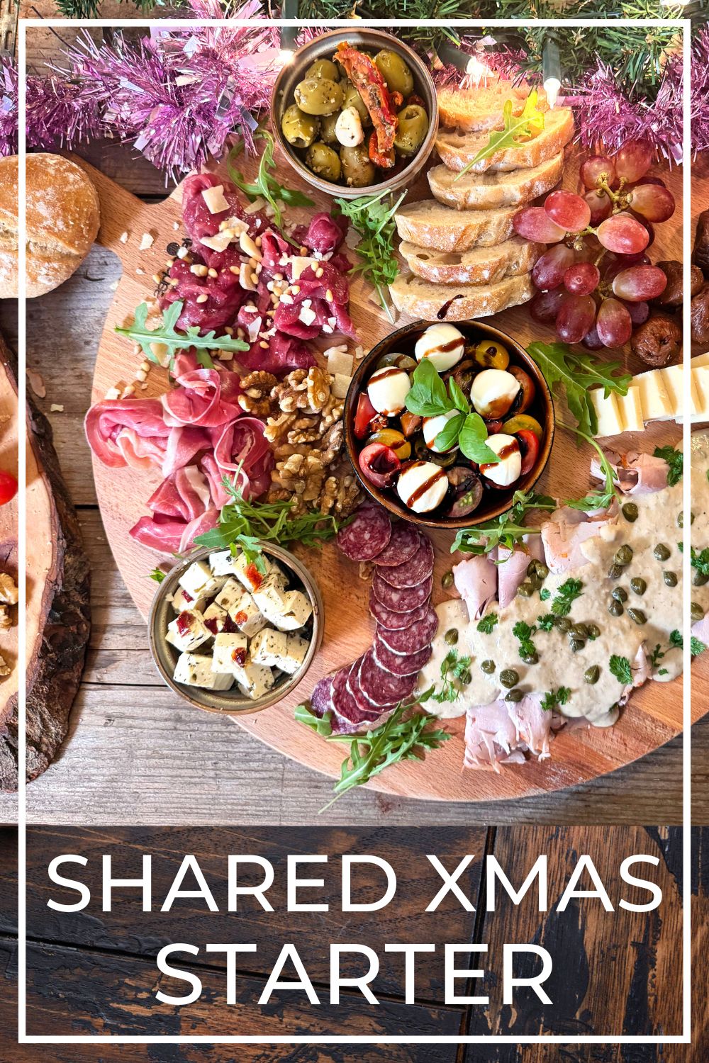 Christmas antipasti platter with vitello tonnato, caprese, meats and cheeses.