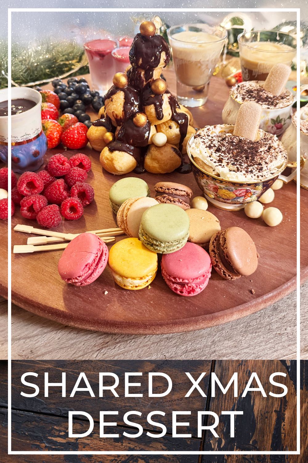 Shared Christmas dessert platter with tiramisu, profiteroles and chocolate sauce.