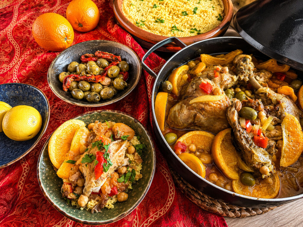 Moroccan chicken tagine with oranges, apricots, olives and couscous.