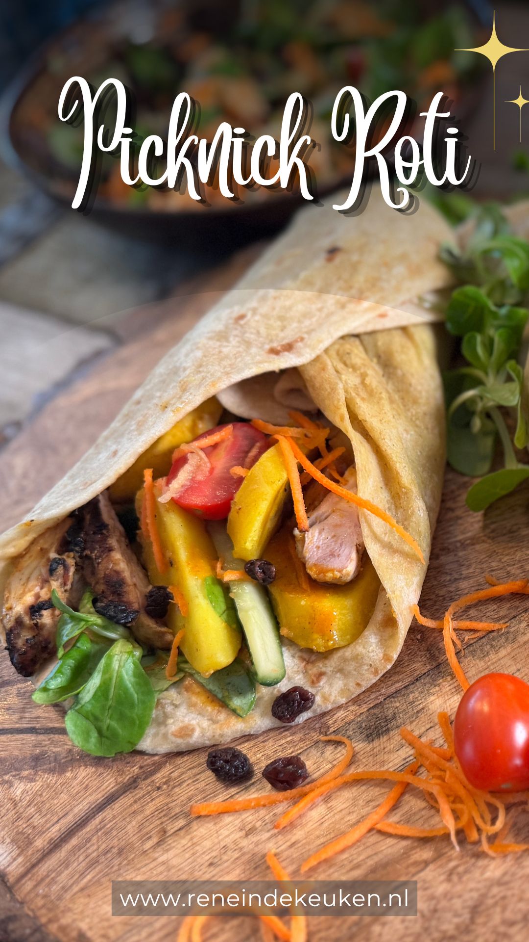 Picnic roti wrap filled with grilled masala chicken, potato, plantain, lamb's lettuce, cherry tomatoes, carrot and green apple.